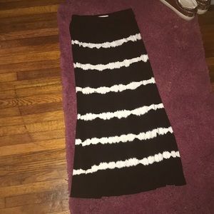 A long simple black and white skirt